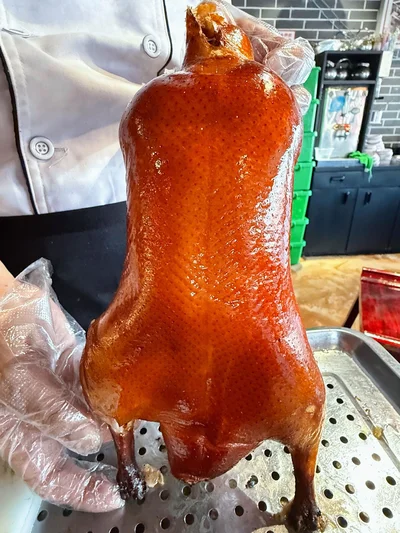 Why Peking Duck Tastes Different in Beijing: Ingredients, Technique, and Wood Choice