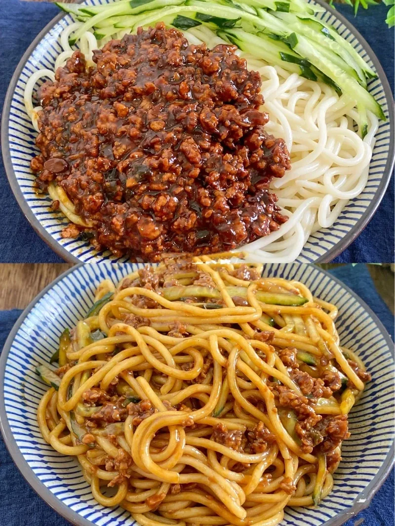 Beijing Zhajiang Noodles topped with minced pork soybean paste and shredded cucumber.