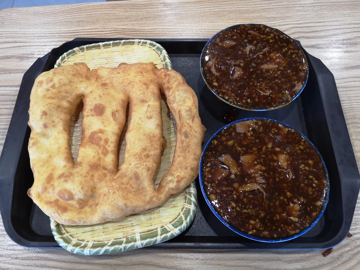 Traditional Beijing breakfast tray with chaogan and fried youbing