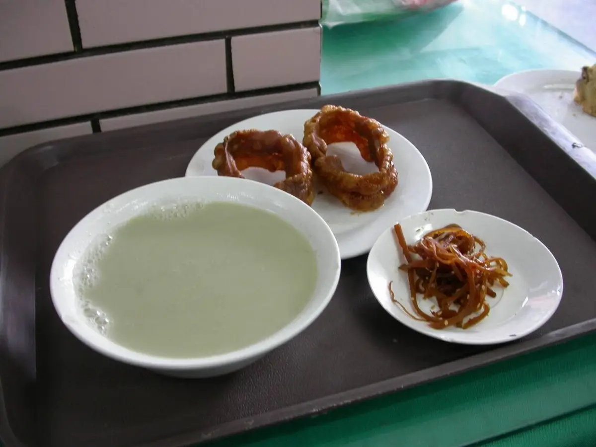 Close view of pale green Beijing douzhi in a bowl