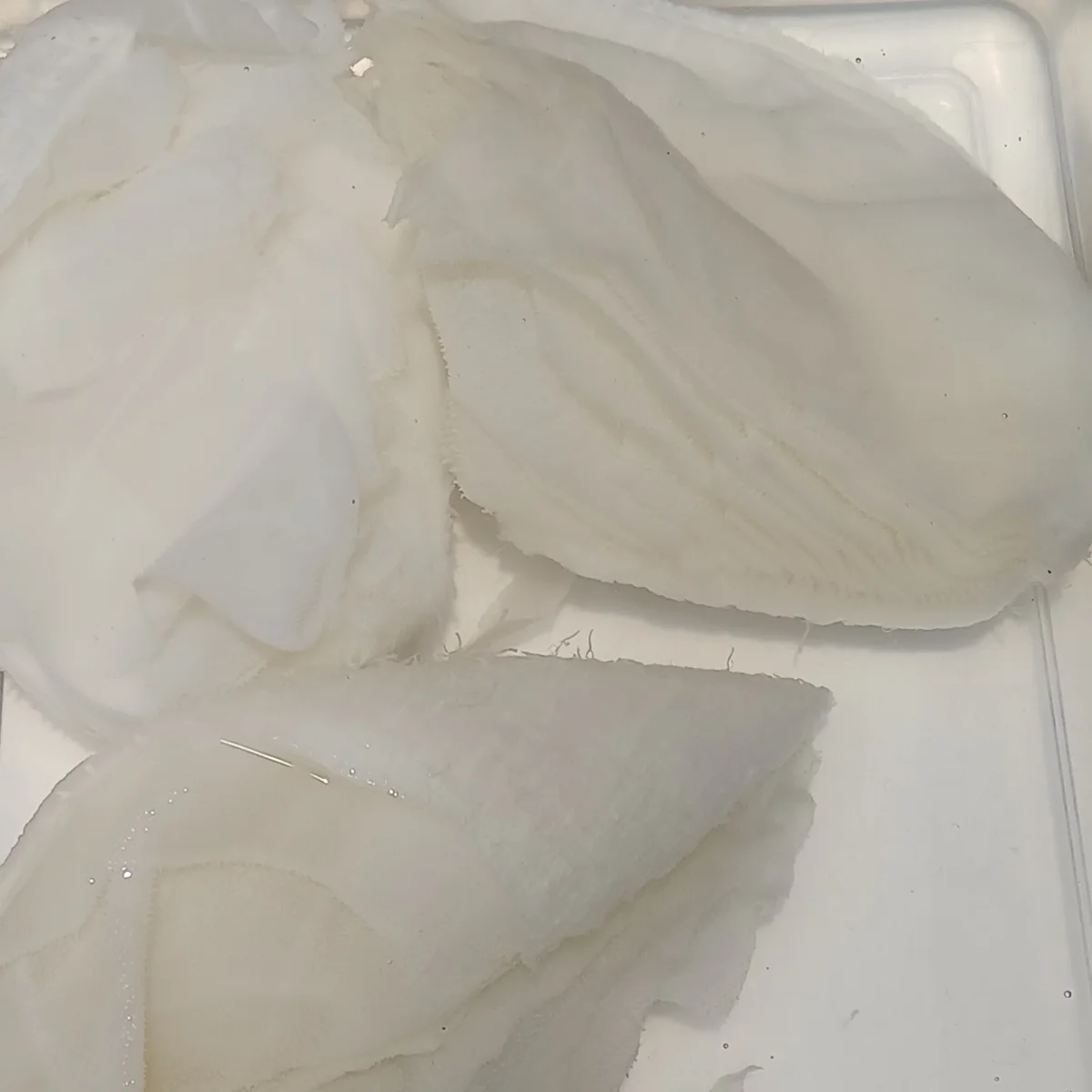 Thin pale beef tripe sheets showing the folded texture of baiye