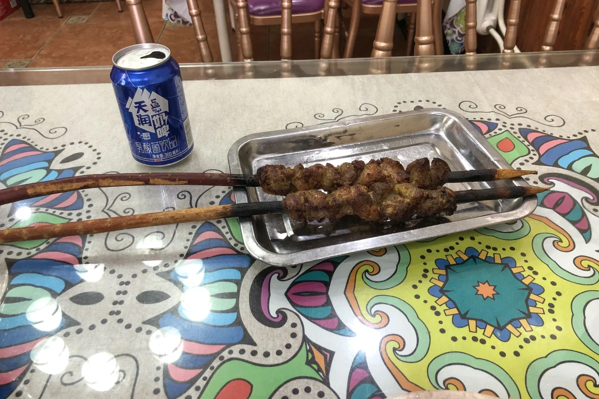 Grilled lamb kebabs served on tamarisk skewers in Beijing
