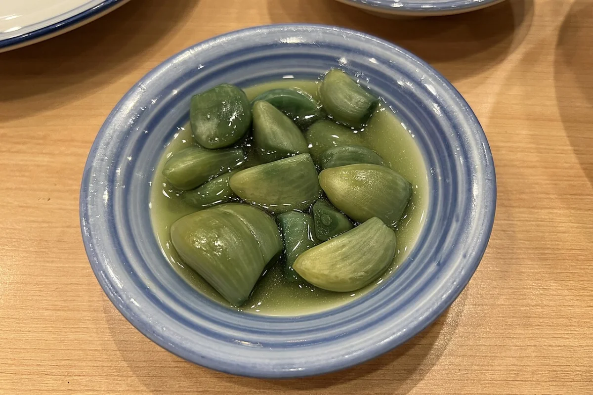 Green vinegar-pickled Laba garlic at Hongzhuangyuan in Shangdi, Beijing, photographed in January 2022